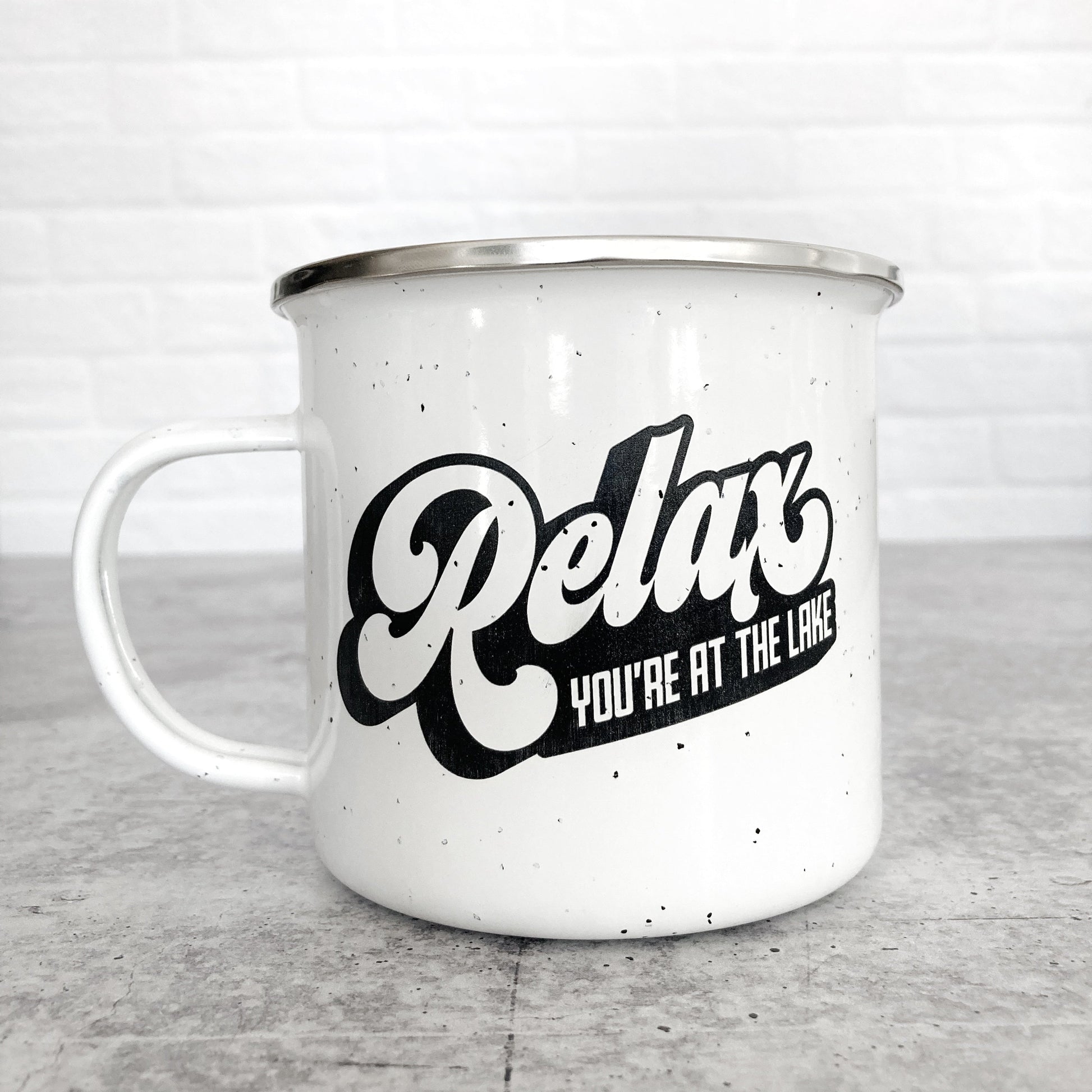Relax You're At The Lake design on a white enamel mug