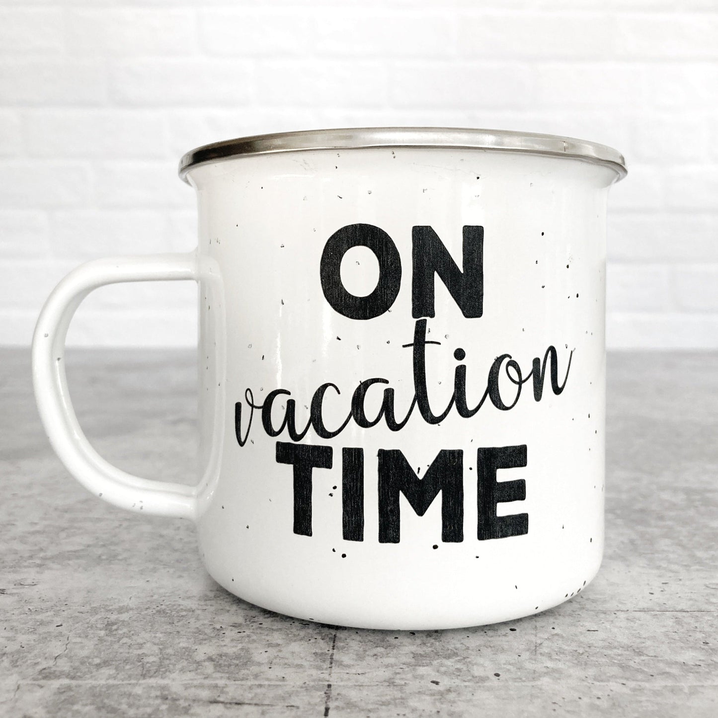 On Vacation time design on a white enamel mug