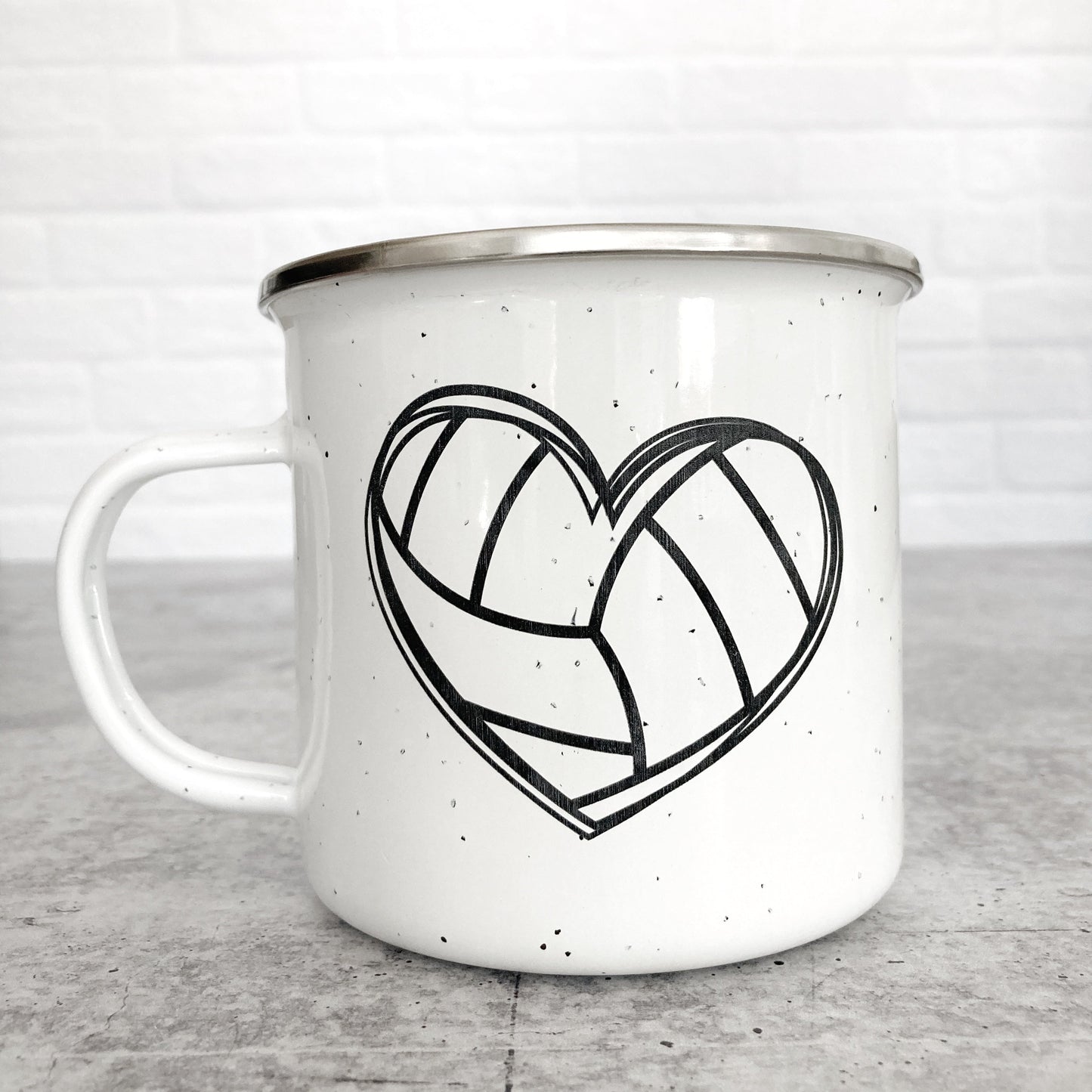Volleyball heart design on a white enamel mug